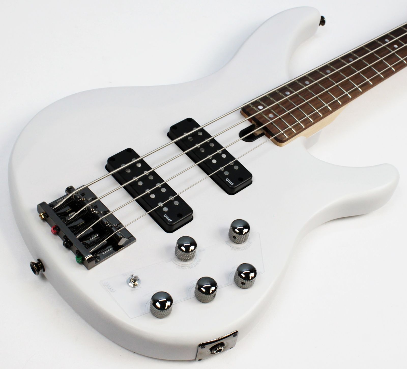 Yamaha TRBX304 4-string bass white front of body angled