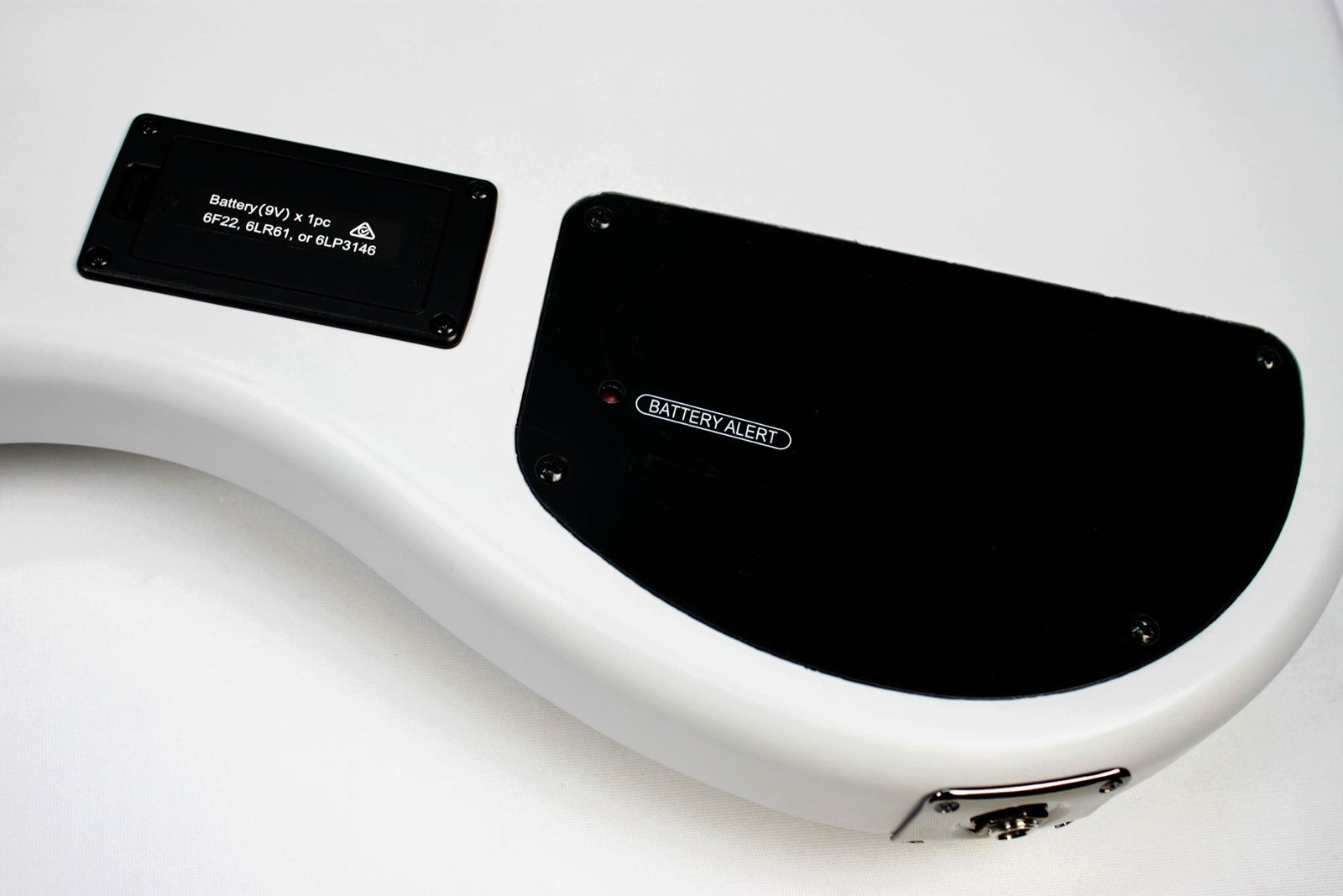 Yamaha TRBX304 4-string bass white battery plate control cavity