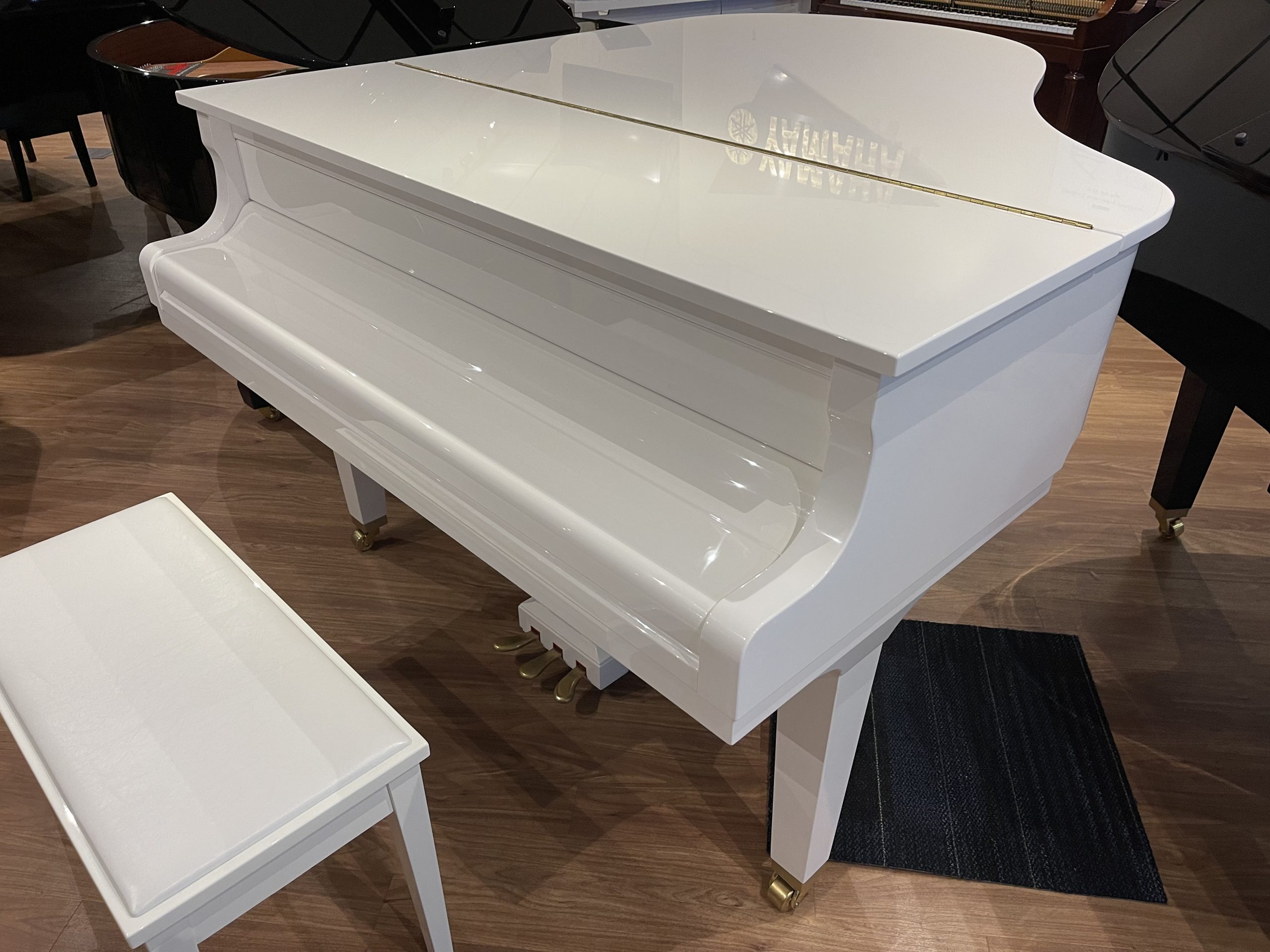 White Yamaha CG2 Grand Piano