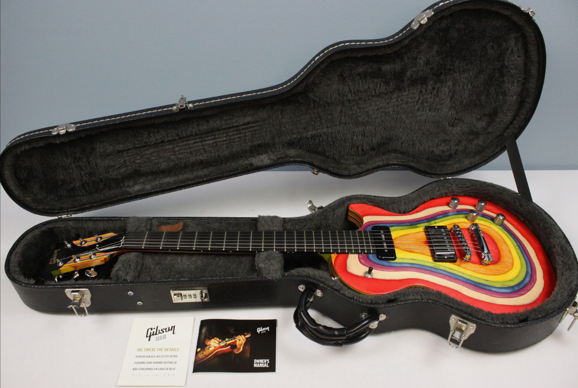 2013 Gibson Les Paul Zoot Suit, Gibson Les Paul Zoot Suit, Gibson Zoot Suit Rainbow, Rainbow Les Paul, 2013 Gibson Les Paul, Gibson USA Les Paul, Zoot Suit Guitar, Rainbow Electric Guitar, Limited Edition Gibson, Gibson Les Paul Rainbow Finish, Exotic Wood Les Paul, Multicolor Les Paul, Gibson Electric Guitar, Collectible Gibson Guitar, Rare Gibson Les Paul, Gibson Les Paul Standard, Les Paul Guitar, Made in USA Gibson, Vintage Gibson Electric Guitar, Gibson Guitar Collector, Rainbow Wood Guitar, Gibson Zoot Suit Series, Electric Guitar for Sale, Premium Gibson Guitar, Gibson Les Paul 2013 Rainbow, Unique Finish Les Paul, Gibson Solid Body Guitar, Rock Guitar, Blues Guitar, Gibson USA Electric Guitar, High-End Les Paul, Guitar Collector Piece, Gibson Zoot Suit Limited Edition, Rainbow Stripe Guitar, Gibson Les Paul Natural Wood, Rare Electric Guitar, Gibson Guitar USA, Professional Electric Guitar, Gibson Les Paul Custom Style, Guitar Enthusiast Collectible