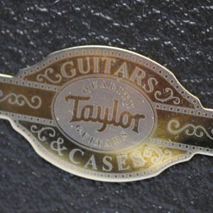 Taylor Builder’s Edition 514ce Tobacco Kona Burst acoustic-electric guitar emblem on deluxe hard shell case