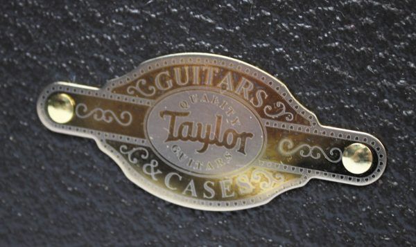 Taylor Builder’s Edition 514ce Tobacco Kona Burst acoustic-electric guitar emblem on deluxe hard shell case