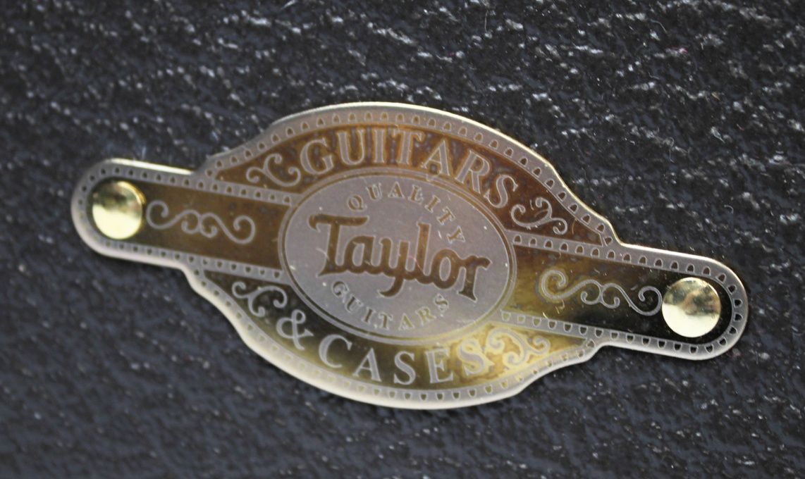 Taylor Builder’s Edition 514ce Tobacco Kona Burst acoustic-electric guitar emblem on deluxe hard shell case