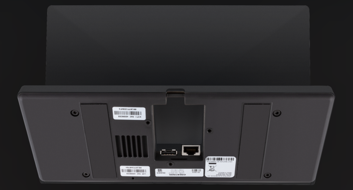 Crestron TS-1070-B-S label and model information sticker on bottom panel.
