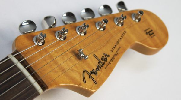 Brand new Fender Limited Edition American Vintage II ’61 Stratocaster in Fiesta Red front of headstock