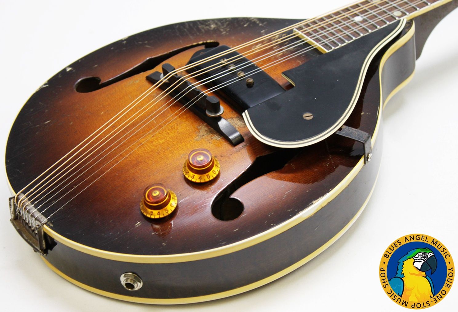 Gibson EM-150 Mandolin, Gibson EM-150, Gibson Electric Mandolin, Vintage Gibson Mandolin, Gibson P90 Mandolin, Original P-90 Pickup, Late 1940s Gibson, Early 1950s Gibson, 1940s Electric Mandolin, 1950s Electric Mandolin, Vintage Electric Mandolin, Sunburst Mandolin, Gibson Sunburst, USA Made Gibson, Kalamazoo Gibson, Collectible Gibson, Vintage String Instrument, P90 Tone, Upgraded Gibson Mandolin, Player Grade Vintage Gibson, Rare Gibson Mandolin, Blues Mandolin, Folk Mandolin, Americana Instrument, Electric Folk Instrument, Vintage Music Gear, Original Gibson Pickup, Classic Gibson, Vintage Mandolin for Sale, Blues Angel Music