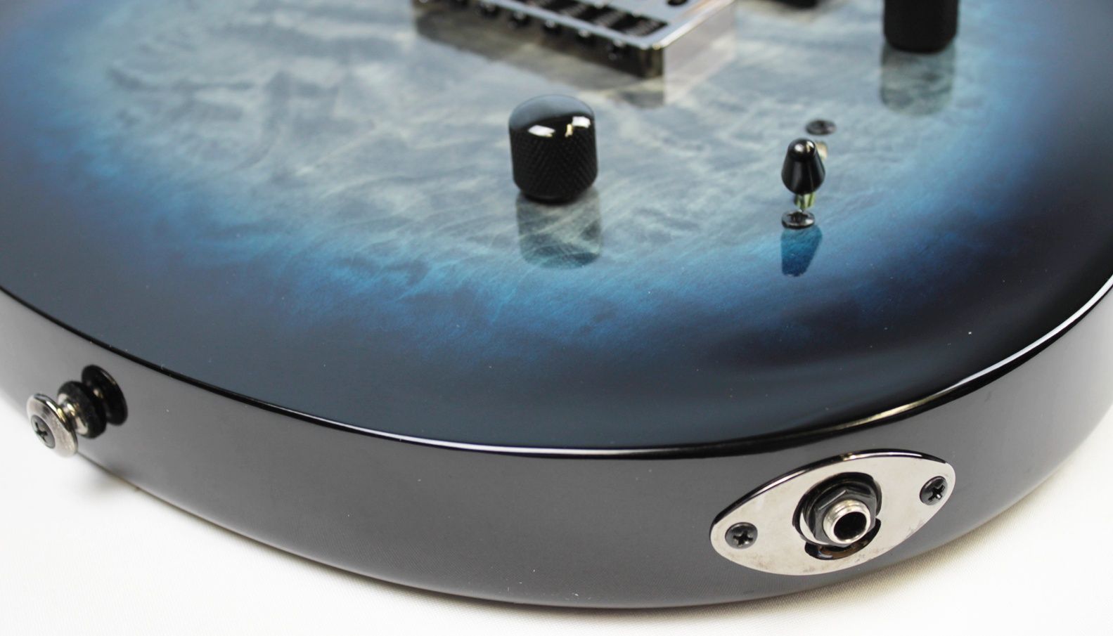 IMG_8774 PRS SE Mark Holcomb 7-String – Body Closeup Quilted Maple Output Jack