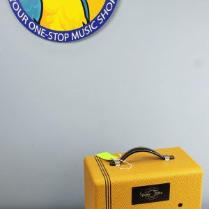 Front view of a Swart Space Tone Atomic Jr 5W combo amp in lacquered tweed showing the control panel and Weber 8-inch speaker. main jojo