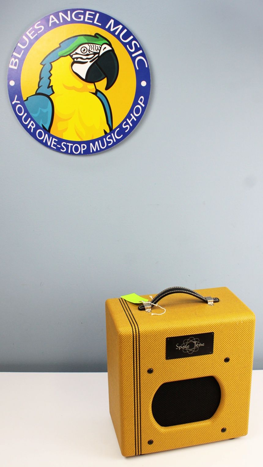 Front view of a Swart Space Tone Atomic Jr 5W combo amp in lacquered tweed showing the control panel and Weber 8-inch speaker. main jojo