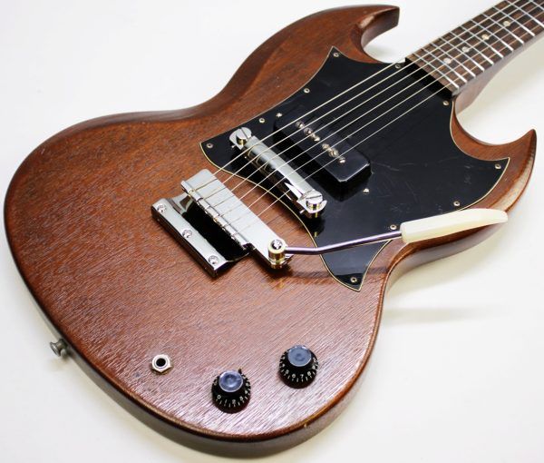 Gibson SG Junior, Gibson SG Junior Large Guard, Early 70s Gibson SG, 1970s Gibson SG Junior, Vintage Gibson SG, Gibson SG Natural Finish, Natural SG Junior, Gibson P90, Vintage P90 Guitar, Gibson Solid Body Electric Guitar, Made in USA Gibson, Vintage Gibson Electric, Large Pickguard SG, Norlin Era Gibson, Classic Rock Guitar, Blues Guitar, Vintage Guitar, Collector Grade Guitar, Player Grade Vintage Guitar, Resonant SG Junior, Chunky Neck Gibson, Single Pickup Gibson, Gibson Junior Model, Vintage SG Player, Early 70s SG, Natural Finish Gibson SG, Gibson SG Junior Natural, Amazing Player, Ready to Go, Vintage Electric Guitar, USA Made Guitar, Gibson Guitar, Retro Rock Guitar, Classic Gibson Tone, Vintage P90 Tone, SG Junior Large Guard Natural, Early 1970s Gibson SG Junior, Vintage Gibson USA, Natural Wood Grain SG, Gibson SG Single Cutaway, Gig Ready Guitar