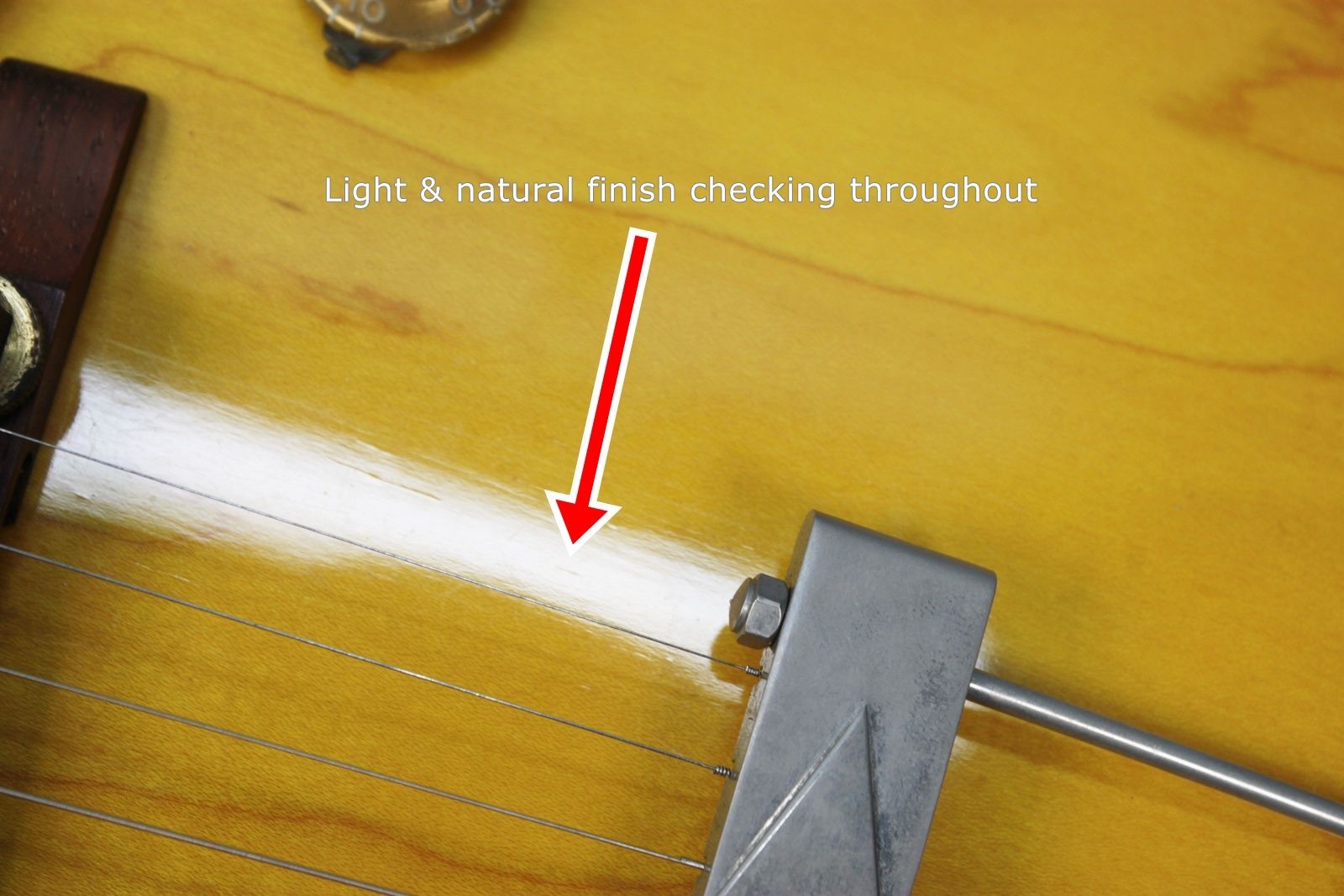 Gibson ES-125C 1965 - Cherry Sunburst checking by bridge
