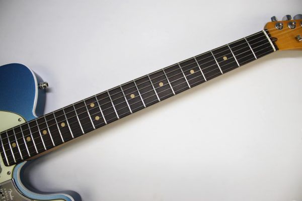 Fender, American Ultra Luxe, Vintage '60s Telecaster, Telecaster Custom, Lake Placid Blue, electric guitar, USA made, alder body, rosewood fingerboard, Pure Vintage '63 pickups, nitro lacquer, Heirloom lacquer, double bound Telecaster, modern D neck, compound radius, stainless steel frets, locking tuners, S-1 switching, premium Fender Telecaster, boutique Tele tone, vintage style Tele, modern playability, Fender USA, Telecaster electric guitar, 2025 Fender, Lake Placid Blue Tele, custom Telecaster, high end Telecaster, Corona California, 22 fret Telecaster, Fender Ultra Luxe, mint green pickguard, bound body Tele, professional guitar, collectible Fender, Telecaster custom shop inspired, classic Tele tone, contemporary Telecaster, Fender guitar, electric guitar, blues guitar, rock guitar, country guitar, studio guitar, stage guitar