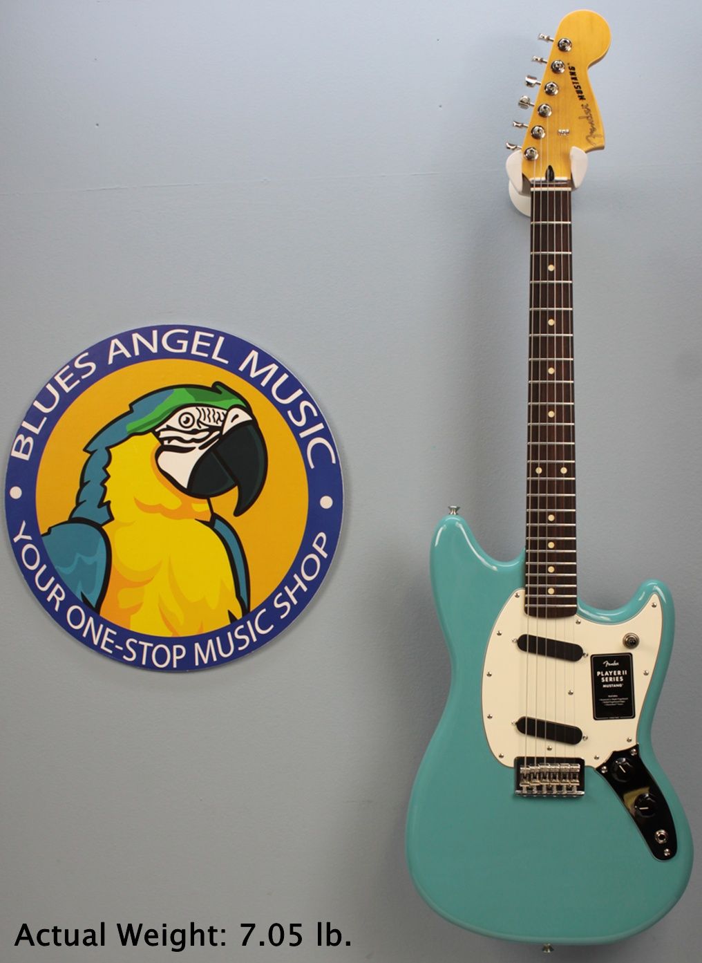 Fender Player II Mustang 2026 - Aquatone Blue - landing photo with parrot jojo logo