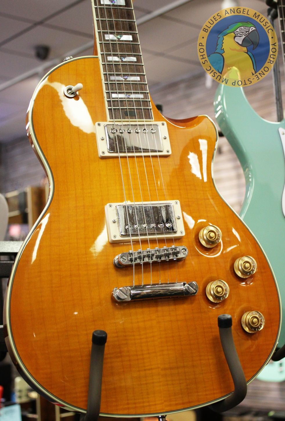 Larrivée RS-4, Larrivée RS4, Larrivée Electric Guitar, RS-4 Amber, Amber Finish, Single Cut Guitar, Flamed Maple Top, Mahogany Body, Mahogany Neck, Rosewood Fingerboard, Set Neck Guitar, Larrivée Humbuckers, TonePros Bridge, Schaller Tuners, CTS Electronics, Luxe Bumblebee Capacitors, Boutique Electric Guitar, Canadian Guitar Maker, Premium Electric Guitar, Dual Humbucker Guitar, Rock Guitar, Blues Guitar, Classic Rock, Vintage Style Electric, 2008 Larrivée, Amber Burst, Single Cutaway, High-End Electric Guitar, Made in Canada, Larrivee RS-4 Amber, Used Larrivée Guitar, Rare Larrivée Electric, Flame Maple Top Guitar, Sustain Rich Guitar, Collector Grade Guitar, Professional Guitar, Electric Guitar 2008