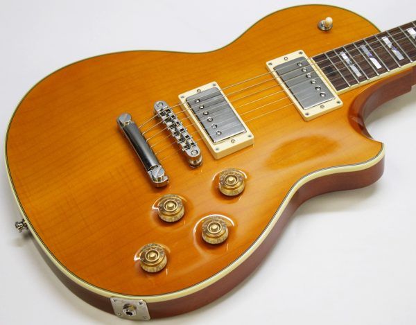 Larrivée RS-4, Larrivée RS4, Larrivée Electric Guitar, RS-4 Amber, Amber Finish, Single Cut Guitar, Flamed Maple Top, Mahogany Body, Mahogany Neck, Rosewood Fingerboard, Set Neck Guitar, Larrivée Humbuckers, TonePros Bridge, Schaller Tuners, CTS Electronics, Luxe Bumblebee Capacitors, Boutique Electric Guitar, Canadian Guitar Maker, Premium Electric Guitar, Dual Humbucker Guitar, Rock Guitar, Blues Guitar, Classic Rock, Vintage Style Electric, 2008 Larrivée, Amber Burst, Single Cutaway, High-End Electric Guitar, Made in Canada, Larrivee RS-4 Amber, Used Larrivée Guitar, Rare Larrivée Electric, Flame Maple Top Guitar, Sustain Rich Guitar, Collector Grade Guitar, Professional Guitar, Electric Guitar 2008