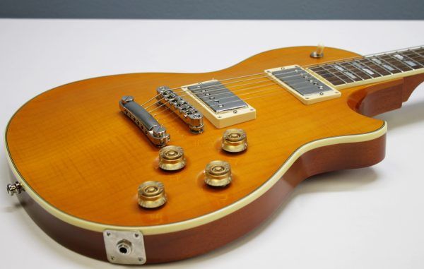 Larrivée RS-4, Larrivée RS4, Larrivée Electric Guitar, RS-4 Amber, Amber Finish, Single Cut Guitar, Flamed Maple Top, Mahogany Body, Mahogany Neck, Rosewood Fingerboard, Set Neck Guitar, Larrivée Humbuckers, TonePros Bridge, Schaller Tuners, CTS Electronics, Luxe Bumblebee Capacitors, Boutique Electric Guitar, Canadian Guitar Maker, Premium Electric Guitar, Dual Humbucker Guitar, Rock Guitar, Blues Guitar, Classic Rock, Vintage Style Electric, 2008 Larrivée, Amber Burst, Single Cutaway, High-End Electric Guitar, Made in Canada, Larrivee RS-4 Amber, Used Larrivée Guitar, Rare Larrivée Electric, Flame Maple Top Guitar, Sustain Rich Guitar, Collector Grade Guitar, Professional Guitar, Electric Guitar 2008