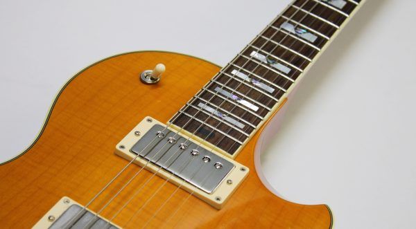 Larrivée RS-4, Larrivée RS4, Larrivée Electric Guitar, RS-4 Amber, Amber Finish, Single Cut Guitar, Flamed Maple Top, Mahogany Body, Mahogany Neck, Rosewood Fingerboard, Set Neck Guitar, Larrivée Humbuckers, TonePros Bridge, Schaller Tuners, CTS Electronics, Luxe Bumblebee Capacitors, Boutique Electric Guitar, Canadian Guitar Maker, Premium Electric Guitar, Dual Humbucker Guitar, Rock Guitar, Blues Guitar, Classic Rock, Vintage Style Electric, 2008 Larrivée, Amber Burst, Single Cutaway, High-End Electric Guitar, Made in Canada, Larrivee RS-4 Amber, Used Larrivée Guitar, Rare Larrivée Electric, Flame Maple Top Guitar, Sustain Rich Guitar, Collector Grade Guitar, Professional Guitar, Electric Guitar 2008