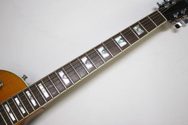 Larrivée RS-4, Larrivée RS4, Larrivée Electric Guitar, RS-4 Amber, Amber Finish, Single Cut Guitar, Flamed Maple Top, Mahogany Body, Mahogany Neck, Rosewood Fingerboard, Set Neck Guitar, Larrivée Humbuckers, TonePros Bridge, Schaller Tuners, CTS Electronics, Luxe Bumblebee Capacitors, Boutique Electric Guitar, Canadian Guitar Maker, Premium Electric Guitar, Dual Humbucker Guitar, Rock Guitar, Blues Guitar, Classic Rock, Vintage Style Electric, 2008 Larrivée, Amber Burst, Single Cutaway, High-End Electric Guitar, Made in Canada, Larrivee RS-4 Amber, Used Larrivée Guitar, Rare Larrivée Electric, Flame Maple Top Guitar, Sustain Rich Guitar, Collector Grade Guitar, Professional Guitar, Electric Guitar 2008