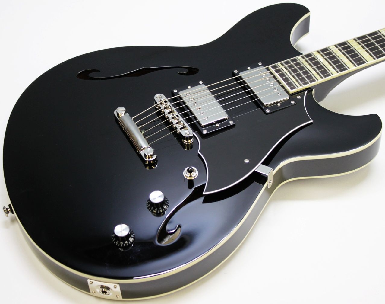 Rivolta Regata VII, Rivolta Guitars, Regata VII, Toro Black, 2021 Rivolta, semi-hollow guitar, electric guitar, offset guitar, dual humbuckers, Brevetto humbuckers, ebony fretboard, mahogany neck, maple body, center block guitar, set neck, 24 frets, boutique guitar, retro style guitar, Korean made guitar, nickel hardware, Tune-O-Matic bridge, stoptail tailpiece, black finish, Rivolta Mondata, Dennis Fano design, Fano inspired guitar, modern vintage guitar, alternative rock guitar, indie guitar, blues guitar, jazz guitar, collectible guitar, premium electric guitar