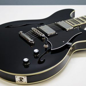 Rivolta Regata VII, Rivolta Guitars, Regata VII, Toro Black, 2021 Rivolta, semi-hollow guitar, electric guitar, offset guitar, dual humbuckers, Brevetto humbuckers, ebony fretboard, mahogany neck, maple body, center block guitar, set neck, 24 frets, boutique guitar, retro style guitar, Korean made guitar, nickel hardware, Tune-O-Matic bridge, stoptail tailpiece, black finish, Rivolta Mondata, Dennis Fano design, Fano inspired guitar, modern vintage guitar, alternative rock guitar, indie guitar, blues guitar, jazz guitar, collectible guitar, premium electric guitar