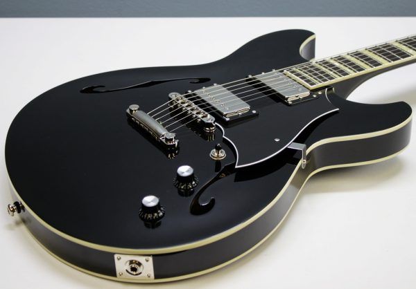Rivolta Regata VII, Rivolta Guitars, Regata VII, Toro Black, 2021 Rivolta, semi-hollow guitar, electric guitar, offset guitar, dual humbuckers, Brevetto humbuckers, ebony fretboard, mahogany neck, maple body, center block guitar, set neck, 24 frets, boutique guitar, retro style guitar, Korean made guitar, nickel hardware, Tune-O-Matic bridge, stoptail tailpiece, black finish, Rivolta Mondata, Dennis Fano design, Fano inspired guitar, modern vintage guitar, alternative rock guitar, indie guitar, blues guitar, jazz guitar, collectible guitar, premium electric guitar