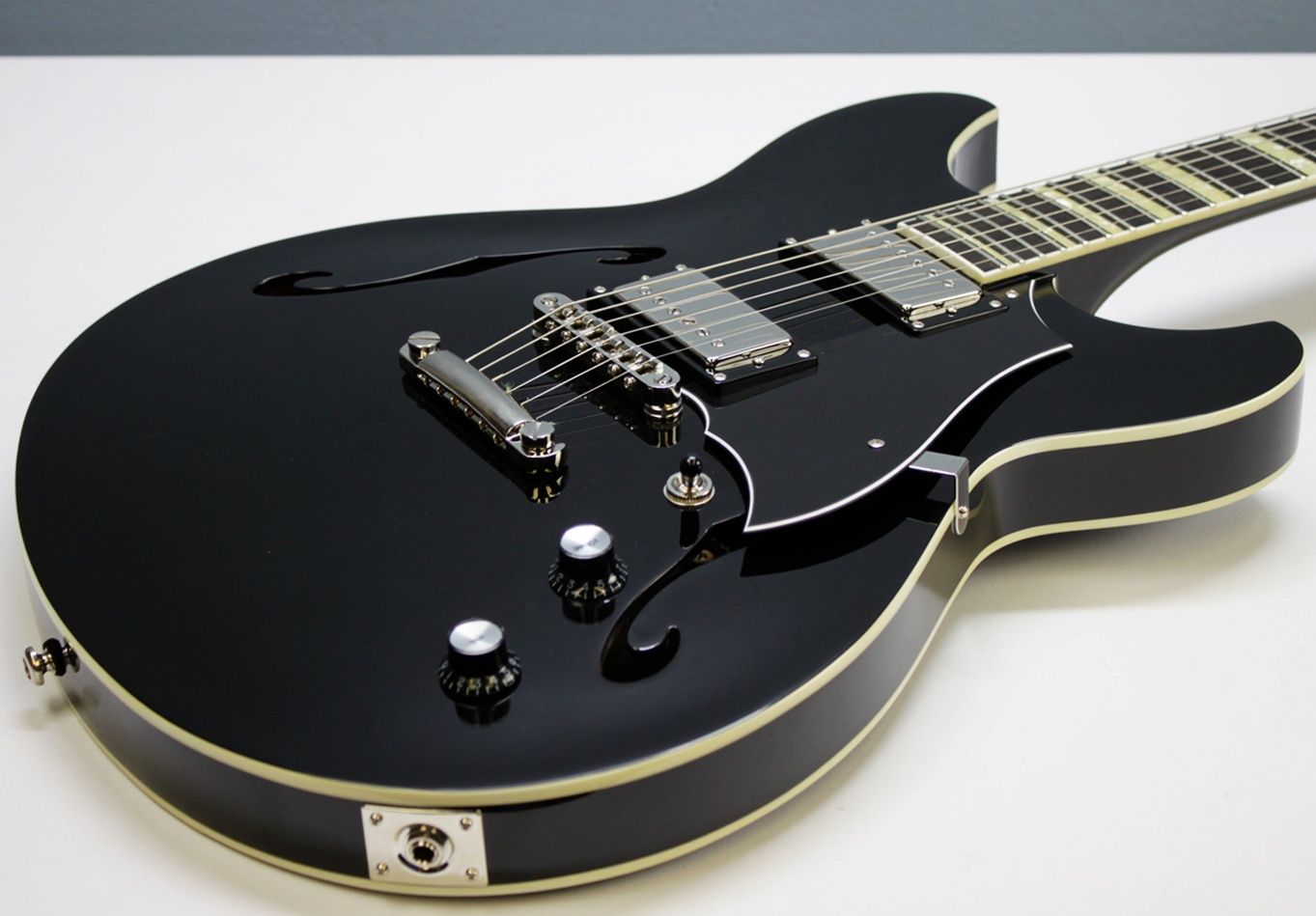 Rivolta Regata VII, Rivolta Guitars, Regata VII, Toro Black, 2021 Rivolta, semi-hollow guitar, electric guitar, offset guitar, dual humbuckers, Brevetto humbuckers, ebony fretboard, mahogany neck, maple body, center block guitar, set neck, 24 frets, boutique guitar, retro style guitar, Korean made guitar, nickel hardware, Tune-O-Matic bridge, stoptail tailpiece, black finish, Rivolta Mondata, Dennis Fano design, Fano inspired guitar, modern vintage guitar, alternative rock guitar, indie guitar, blues guitar, jazz guitar, collectible guitar, premium electric guitar