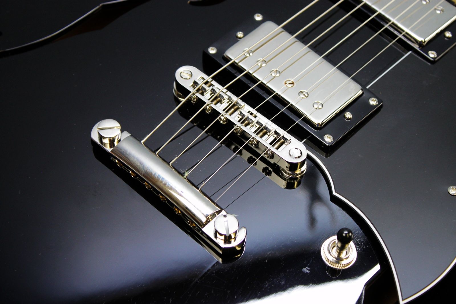 Rivolta Regata VII, Rivolta Guitars, Regata VII, Toro Black, 2021 Rivolta, semi-hollow guitar, electric guitar, offset guitar, dual humbuckers, Brevetto humbuckers, ebony fretboard, mahogany neck, maple body, center block guitar, set neck, 24 frets, boutique guitar, retro style guitar, Korean made guitar, nickel hardware, Tune-O-Matic bridge, stoptail tailpiece, black finish, Rivolta Mondata, Dennis Fano design, Fano inspired guitar, modern vintage guitar, alternative rock guitar, indie guitar, blues guitar, jazz guitar, collectible guitar, premium electric guitar