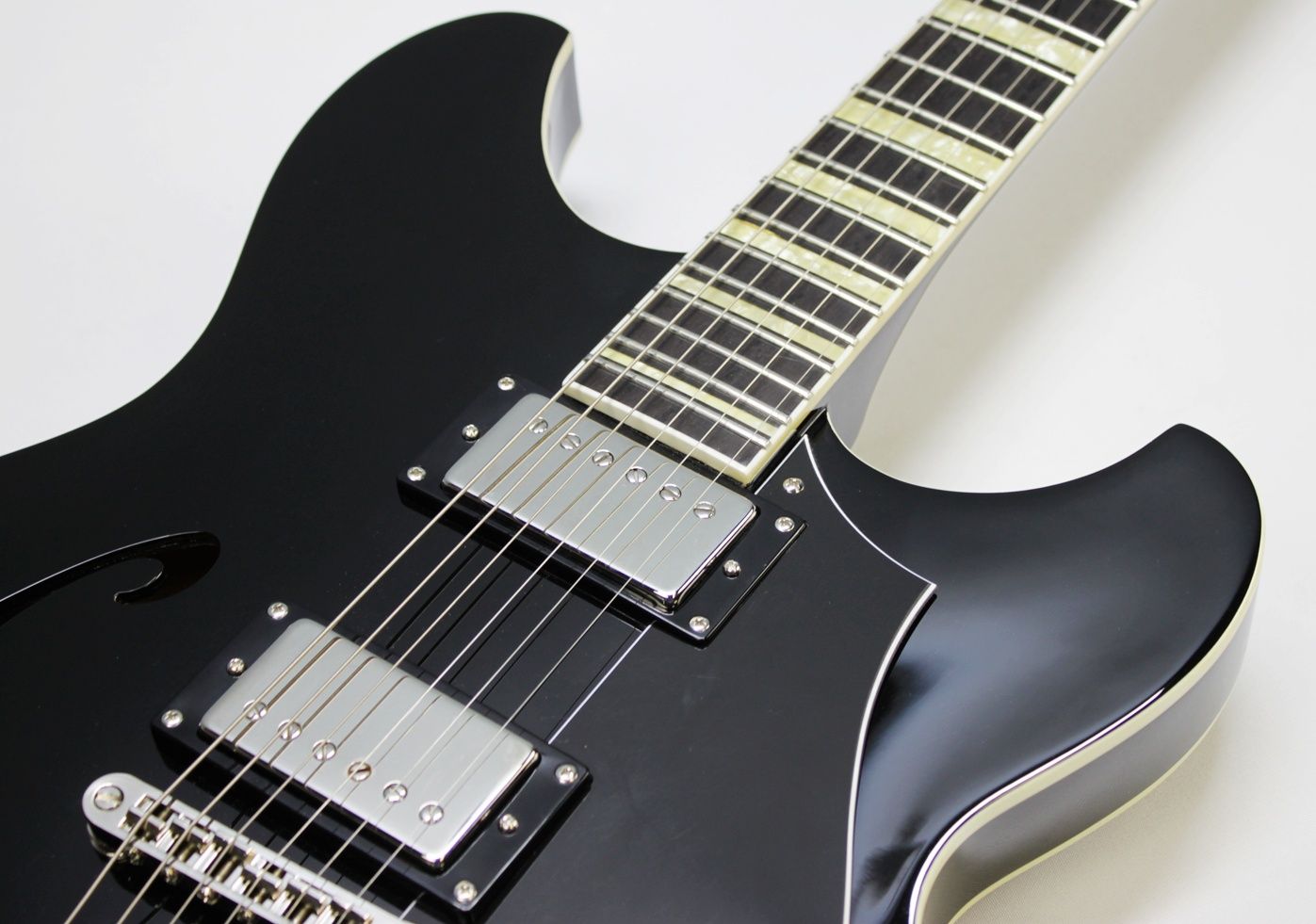 Rivolta Regata VII, Rivolta Guitars, Regata VII, Toro Black, 2021 Rivolta, semi-hollow guitar, electric guitar, offset guitar, dual humbuckers, Brevetto humbuckers, ebony fretboard, mahogany neck, maple body, center block guitar, set neck, 24 frets, boutique guitar, retro style guitar, Korean made guitar, nickel hardware, Tune-O-Matic bridge, stoptail tailpiece, black finish, Rivolta Mondata, Dennis Fano design, Fano inspired guitar, modern vintage guitar, alternative rock guitar, indie guitar, blues guitar, jazz guitar, collectible guitar, premium electric guitar