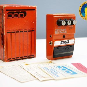 DOD FX15, DOD FX15 Swell Pedal, DOD FX-15, vintage DOD pedal, 1980s guitar pedal, rare DOD pedal, swell pedal, volume swell pedal, reverse guitar effect, violin swell effect, ambient guitar pedal, vintage effects pedal, analog guitar pedal, collectible guitar pedal, DOD effects, made in USA pedal, attack release pedal, cut boost pedal, momentary footswitch pedal, Boss Slow Gear alternative, FX15 orange pedal, guitar effects pedal, vintage stompbox, retro guitar gear, pedalboard collectible, original box included, boxed vintage pedal, 1984 DOD FX15, 1985 DOD FX15, 1986 DOD FX15, discontinued guitar pedal, rare guitar effects pedal, ambient effects, experimental guitar pedal, pedal steel swell effect, vintage DOD FX series