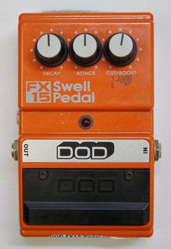 DOD FX15, DOD FX15 Swell Pedal, DOD FX-15, vintage DOD pedal, 1980s guitar pedal, rare DOD pedal, swell pedal, volume swell pedal, reverse guitar effect, violin swell effect, ambient guitar pedal, vintage effects pedal, analog guitar pedal, collectible guitar pedal, DOD effects, made in USA pedal, attack release pedal, cut boost pedal, momentary footswitch pedal, Boss Slow Gear alternative, FX15 orange pedal, guitar effects pedal, vintage stompbox, retro guitar gear, pedalboard collectible, original box included, boxed vintage pedal, 1984 DOD FX15, 1985 DOD FX15, 1986 DOD FX15, discontinued guitar pedal, rare guitar effects pedal, ambient effects, experimental guitar pedal, pedal steel swell effect, vintage DOD FX series
