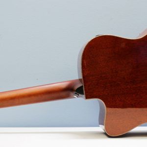 Yamaha AC1M-TBS Solid Sitka Spruce/Mahogany Concert Cutaway with Electronics - Tobacco Brown Sunburst back tilted