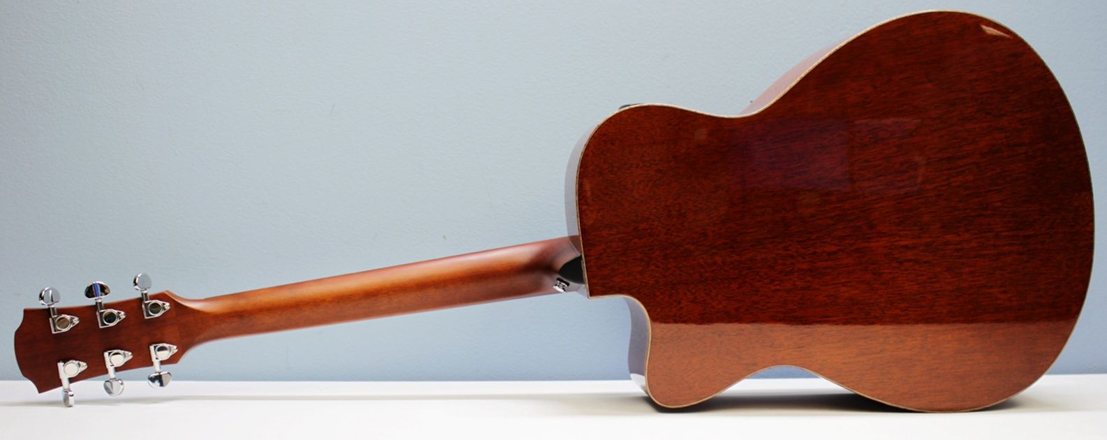 Yamaha AC1M-TBS Solid Sitka Spruce/Mahogany Concert Cutaway with Electronics - Tobacco Brown Sunburst back tilted