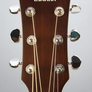 Yamaha AC1M-TBS Solid Sitka Spruce/Mahogany Concert Cutaway with Electronics - Tobacco Brown Sunburst front facing headstock