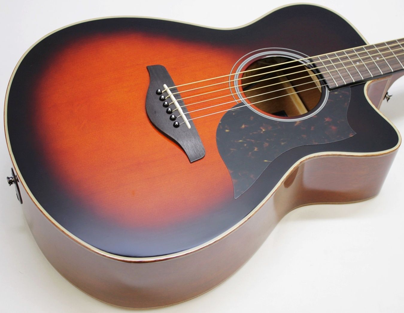 Yamaha AC1M-TBS Solid Sitka Spruce/Mahogany Concert Cutaway with Electronics - Tobacco Brown Sunburst sunburst body angled