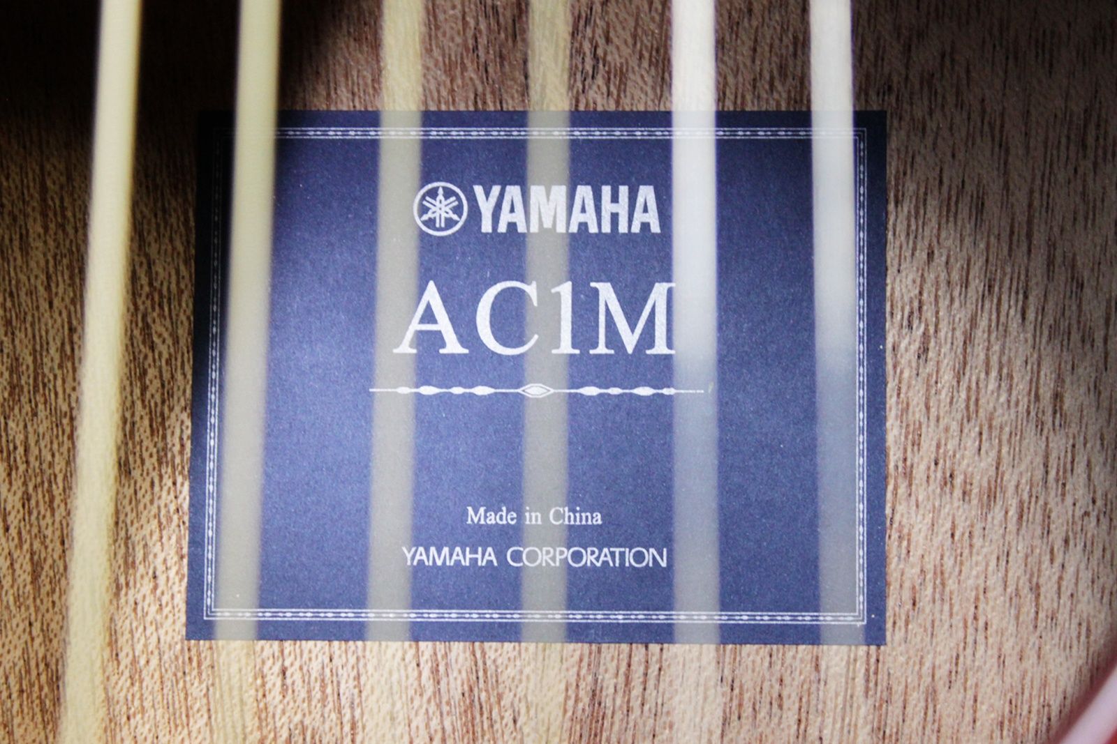 Yamaha AC1M-TBS Solid Sitka Spruce/Mahogany Concert Cutaway with Electronics - Tobacco Brown Sunburst model number