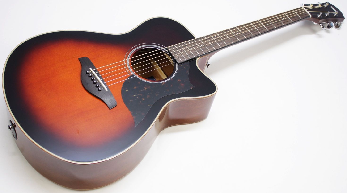 Yamaha AC1M-TBS Solid Sitka Spruce/Mahogany Concert Cutaway with Electronics - Tobacco Brown Sunburst front of the whole guitar
