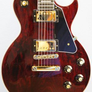 Gibson, Les Paul Custom, Les Paul Custom 70s, Gibson Les Paul Custom, Wine Red, 2025 Gibson, electric guitar, solid body guitar, mahogany body, maple top, set neck, 70s profile neck, volute neck, ebony fingerboard, nitrocellulose lacquer, dual humbuckers, gold hardware, rock guitar, blues guitar, hard rock, classic rock, premium electric guitar, USA made guitar, Gibson USA, 6 string guitar, carved maple top, wine red finish, custom series, Les Paul electric, vintage style guitar, modern classic guitar