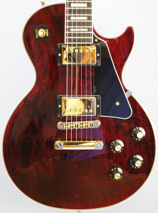 Gibson, Les Paul Custom, Les Paul Custom 70s, Gibson Les Paul Custom, Wine Red, 2025 Gibson, electric guitar, solid body guitar, mahogany body, maple top, set neck, 70s profile neck, volute neck, ebony fingerboard, nitrocellulose lacquer, dual humbuckers, gold hardware, rock guitar, blues guitar, hard rock, classic rock, premium electric guitar, USA made guitar, Gibson USA, 6 string guitar, carved maple top, wine red finish, custom series, Les Paul electric, vintage style guitar, modern classic guitar