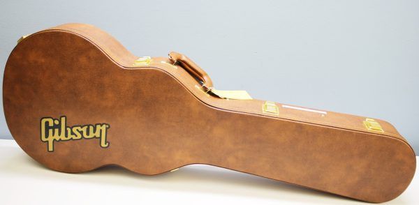 Gibson, Les Paul Custom, Les Paul Custom 70s, Gibson Les Paul Custom, Wine Red, 2025 Gibson, electric guitar, solid body guitar, mahogany body, maple top, set neck, 70s profile neck, volute neck, ebony fingerboard, nitrocellulose lacquer, dual humbuckers, gold hardware, rock guitar, blues guitar, hard rock, classic rock, premium electric guitar, USA made guitar, Gibson USA, 6 string guitar, carved maple top, wine red finish, custom series, Les Paul electric, vintage style guitar, modern classic guitar