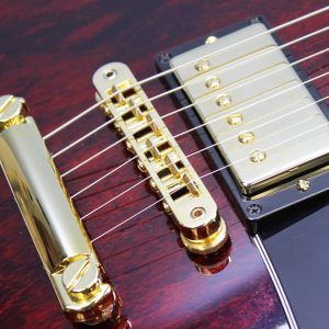 Gibson, Les Paul Custom, Les Paul Custom 70s, Gibson Les Paul Custom, Wine Red, 2025 Gibson, electric guitar, solid body guitar, mahogany body, maple top, set neck, 70s profile neck, volute neck, ebony fingerboard, nitrocellulose lacquer, dual humbuckers, gold hardware, rock guitar, blues guitar, hard rock, classic rock, premium electric guitar, USA made guitar, Gibson USA, 6 string guitar, carved maple top, wine red finish, custom series, Les Paul electric, vintage style guitar, modern classic guitar