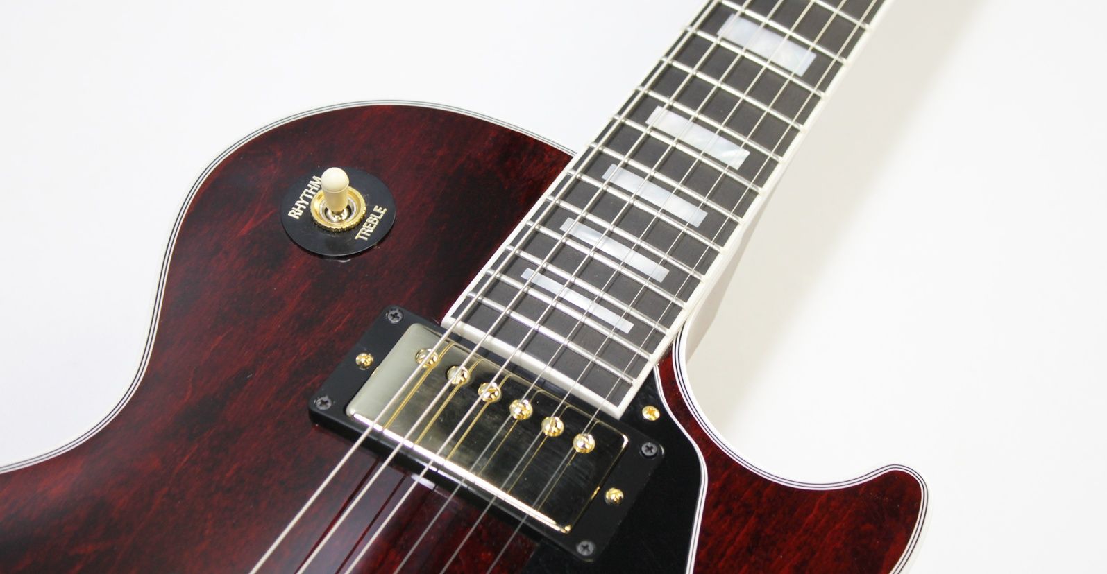 Gibson, Les Paul Custom, Les Paul Custom 70s, Gibson Les Paul Custom, Wine Red, 2025 Gibson, electric guitar, solid body guitar, mahogany body, maple top, set neck, 70s profile neck, volute neck, ebony fingerboard, nitrocellulose lacquer, dual humbuckers, gold hardware, rock guitar, blues guitar, hard rock, classic rock, premium electric guitar, USA made guitar, Gibson USA, 6 string guitar, carved maple top, wine red finish, custom series, Les Paul electric, vintage style guitar, modern classic guitar
