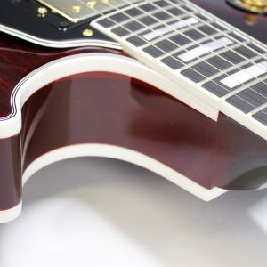 Gibson, Les Paul Custom, Les Paul Custom 70s, Gibson Les Paul Custom, Wine Red, 2025 Gibson, electric guitar, solid body guitar, mahogany body, maple top, set neck, 70s profile neck, volute neck, ebony fingerboard, nitrocellulose lacquer, dual humbuckers, gold hardware, rock guitar, blues guitar, hard rock, classic rock, premium electric guitar, USA made guitar, Gibson USA, 6 string guitar, carved maple top, wine red finish, custom series, Les Paul electric, vintage style guitar, modern classic guitar