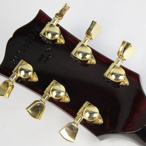 Gibson, Les Paul Custom, Les Paul Custom 70s, Gibson Les Paul Custom, Wine Red, 2025 Gibson, electric guitar, solid body guitar, mahogany body, maple top, set neck, 70s profile neck, volute neck, ebony fingerboard, nitrocellulose lacquer, dual humbuckers, gold hardware, rock guitar, blues guitar, hard rock, classic rock, premium electric guitar, USA made guitar, Gibson USA, 6 string guitar, carved maple top, wine red finish, custom series, Les Paul electric, vintage style guitar, modern classic guitar