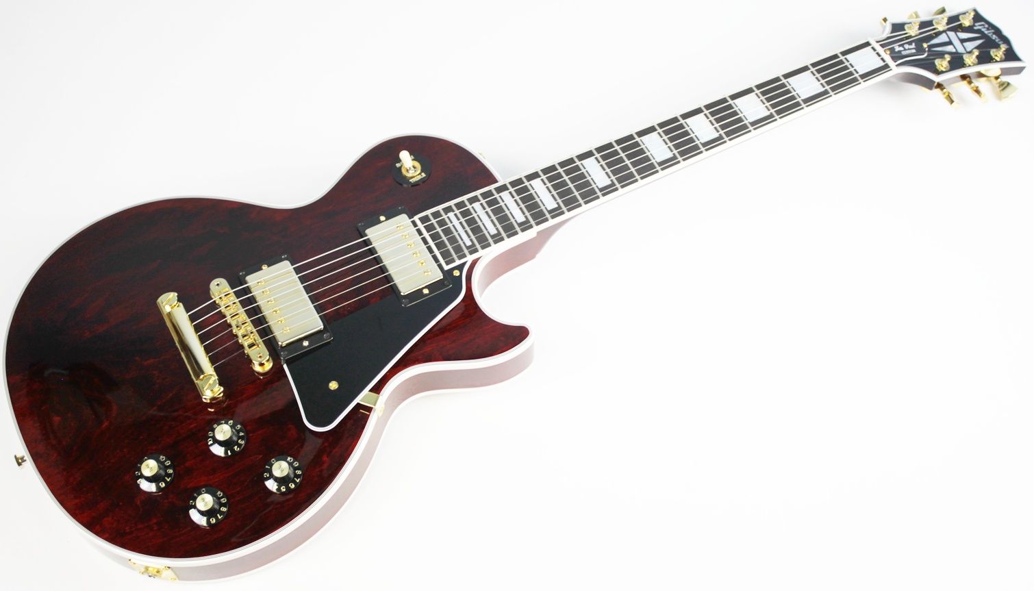 Gibson, Les Paul Custom, Les Paul Custom 70s, Gibson Les Paul Custom, Wine Red, 2025 Gibson, electric guitar, solid body guitar, mahogany body, maple top, set neck, 70s profile neck, volute neck, ebony fingerboard, nitrocellulose lacquer, dual humbuckers, gold hardware, rock guitar, blues guitar, hard rock, classic rock, premium electric guitar, USA made guitar, Gibson USA, 6 string guitar, carved maple top, wine red finish, custom series, Les Paul electric, vintage style guitar, modern classic guitar