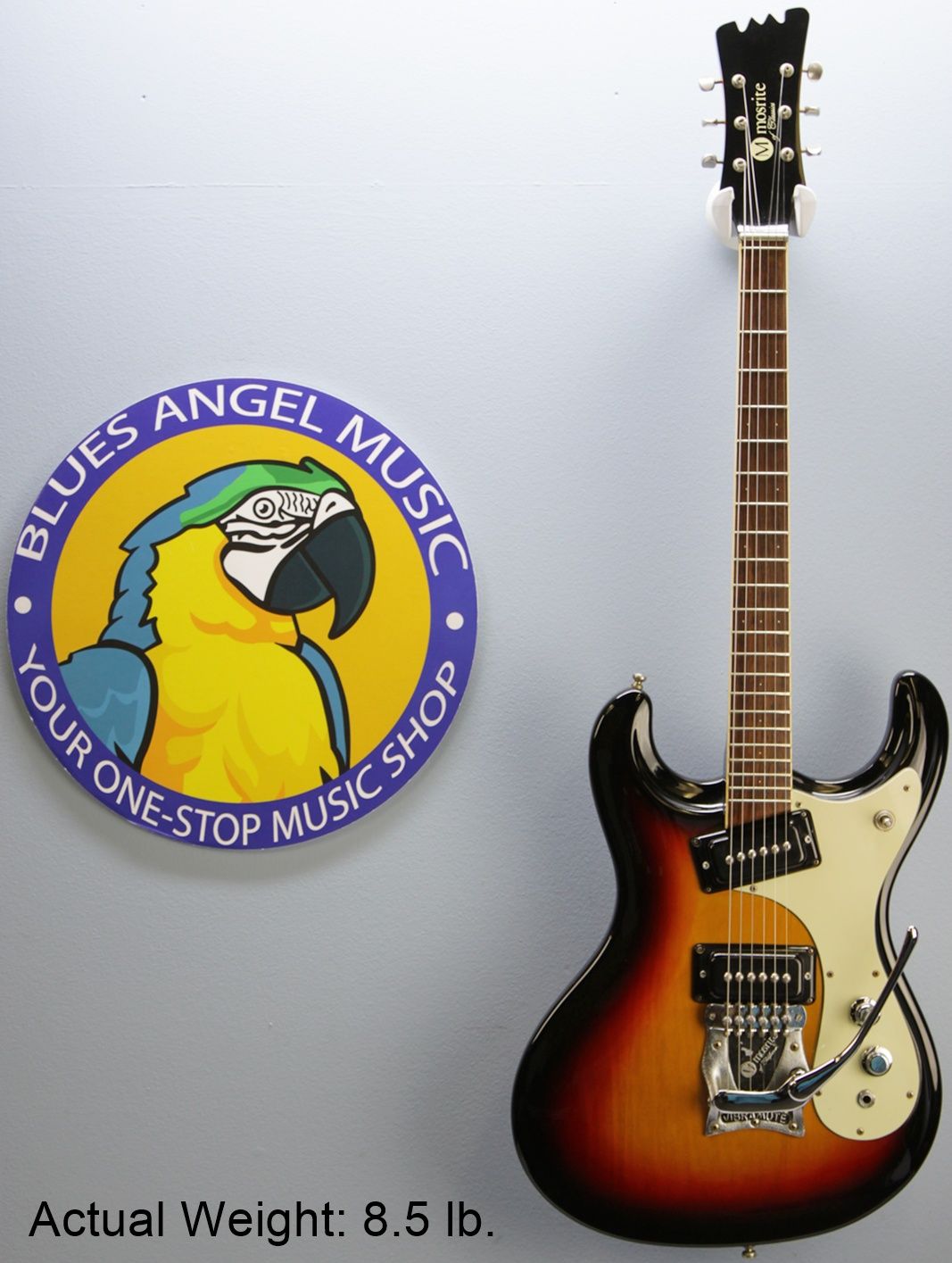 Mosrite, Ventures Model, Mk I, Fillmore, early 2000s, Sunburst, upgraded electronics, upgraded tremolo arm, vintage style guitar, offset electric guitar, surf rock guitar, collectible guitar, rare Mosrite, Japanese guitar, retro guitar, tremolo bridge, bolt-on neck, dual pickup guitar, classic sunburst finish, vintage inspired, player grade guitar, modded Mosrite, Ventures guitar, surf music, electric guitar, preowned guitar, stage ready guitar