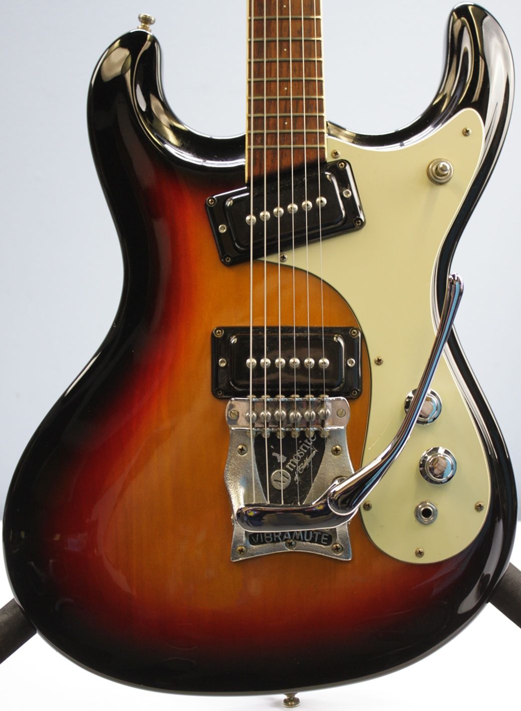 Mosrite, Ventures Model, Mk I, Fillmore, early 2000s, Sunburst, upgraded electronics, upgraded tremolo arm, vintage style guitar, offset electric guitar, surf rock guitar, collectible guitar, rare Mosrite, Japanese guitar, retro guitar, tremolo bridge, bolt-on neck, dual pickup guitar, classic sunburst finish, vintage inspired, player grade guitar, modded Mosrite, Ventures guitar, surf music, electric guitar, preowned guitar, stage ready guitar