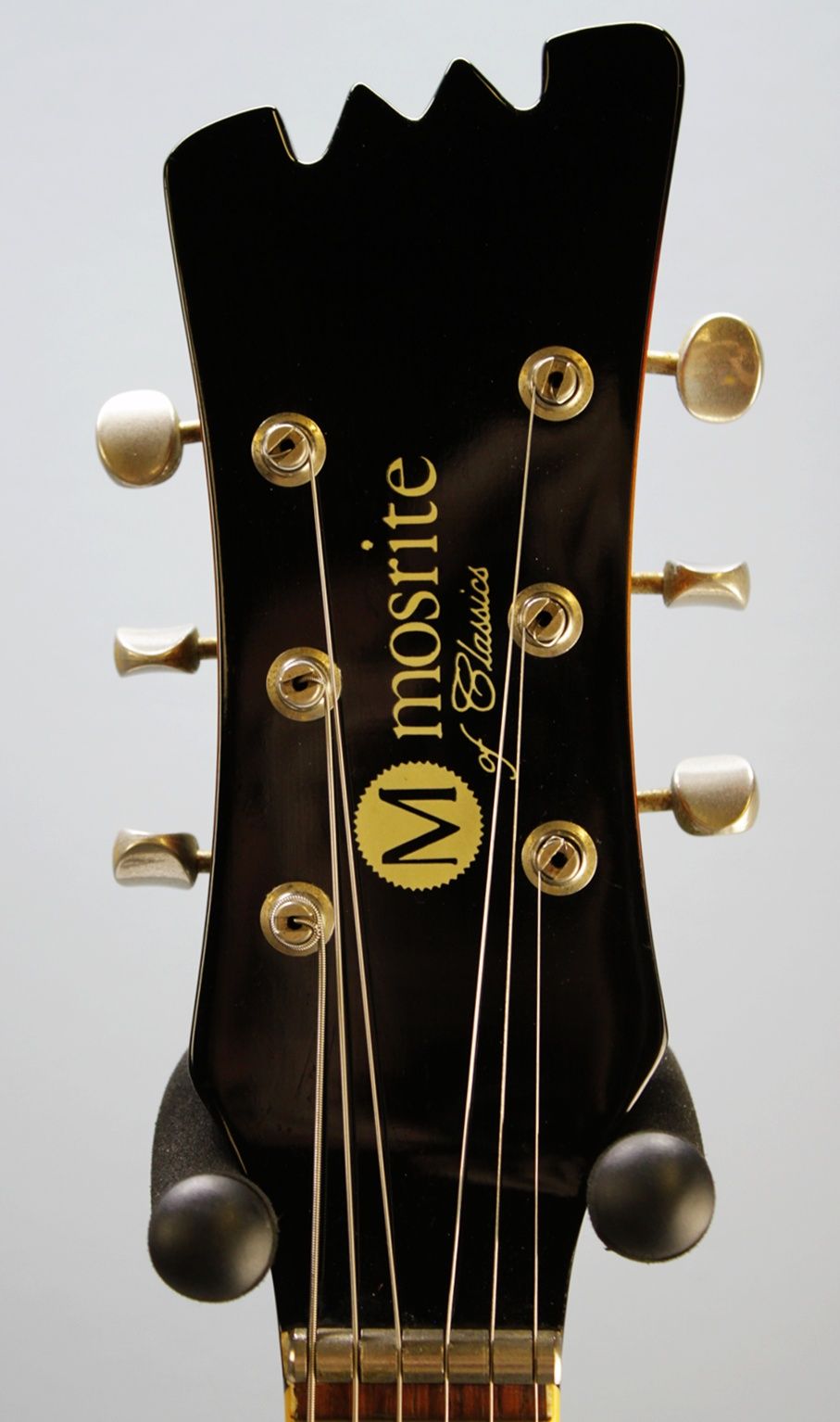 Mosrite, Ventures Model, Mk I, Fillmore, early 2000s, Sunburst, upgraded electronics, upgraded tremolo arm, vintage style guitar, offset electric guitar, surf rock guitar, collectible guitar, rare Mosrite, Japanese guitar, retro guitar, tremolo bridge, bolt-on neck, dual pickup guitar, classic sunburst finish, vintage inspired, player grade guitar, modded Mosrite, Ventures guitar, surf music, electric guitar, preowned guitar, stage ready guitar