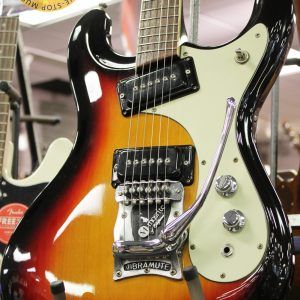 Mosrite, Ventures Model, Mk I, Fillmore, early 2000s, Sunburst, upgraded electronics, upgraded tremolo arm, vintage style guitar, offset electric guitar, surf rock guitar, collectible guitar, rare Mosrite, Japanese guitar, retro guitar, tremolo bridge, bolt-on neck, dual pickup guitar, classic sunburst finish, vintage inspired, player grade guitar, modded Mosrite, Ventures guitar, surf music, electric guitar, preowned guitar, stage ready guitar