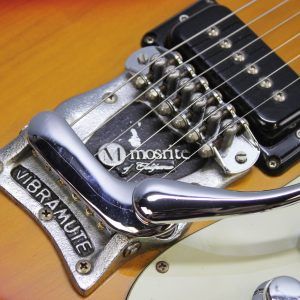 Mosrite, Ventures Model, Mk I, Fillmore, early 2000s, Sunburst, upgraded electronics, upgraded tremolo arm, vintage style guitar, offset electric guitar, surf rock guitar, collectible guitar, rare Mosrite, Japanese guitar, retro guitar, tremolo bridge, bolt-on neck, dual pickup guitar, classic sunburst finish, vintage inspired, player grade guitar, modded Mosrite, Ventures guitar, surf music, electric guitar, preowned guitar, stage ready guitar