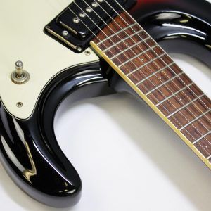 Mosrite, Ventures Model, Mk I, Fillmore, early 2000s, Sunburst, upgraded electronics, upgraded tremolo arm, vintage style guitar, offset electric guitar, surf rock guitar, collectible guitar, rare Mosrite, Japanese guitar, retro guitar, tremolo bridge, bolt-on neck, dual pickup guitar, classic sunburst finish, vintage inspired, player grade guitar, modded Mosrite, Ventures guitar, surf music, electric guitar, preowned guitar, stage ready guitar